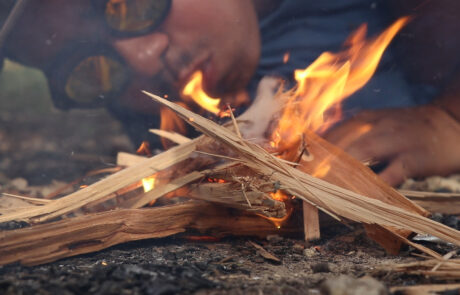 Ben starts ground fire for teaching Campcraft